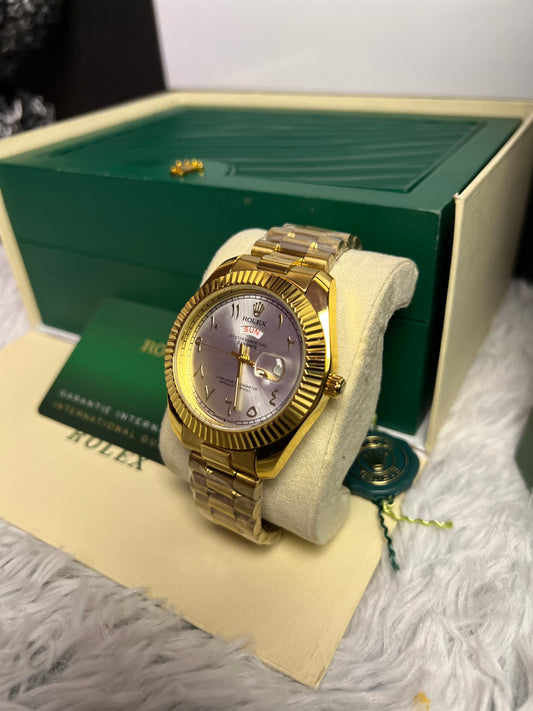 Rolex Gold Day And Date In White Arabic Dial