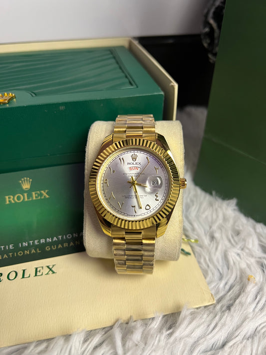 Rolex Gold Day And Date In White Arabic Dial